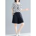 white dotted casual blended pullover and black elastic waist shorts